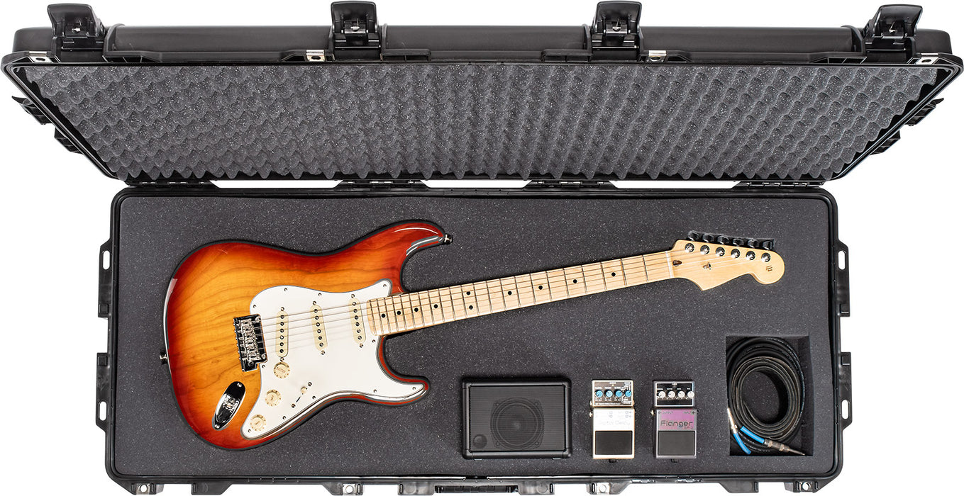 Guitar in black Pelican 1745WF case on white background